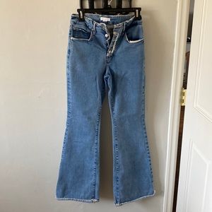 Good American raw exposed button flare 🔥